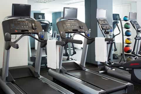 Fitness center with Life Fitness treadmills, exercise equipment, and mirrored walls