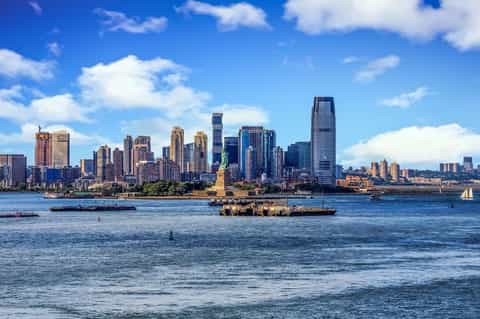New York City skyline with Statue of Liberty and Manhattan waterfront