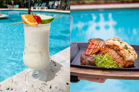 Tropical cocktail by poolside with grilled seafood platter garnished with lobster and fresh greens