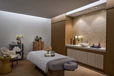 50-Minute Amrit Custom Massage + Spa & Wellness Pass
