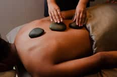 50-Minute Performance Massage + Day Pass