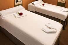 60-Minute Therapeutic Couples Massage + Spa Access