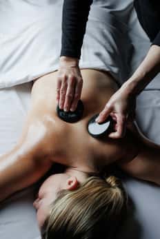 SPAugust: 50-Minute Massage + Hot Stone Enhancement + Pool Access