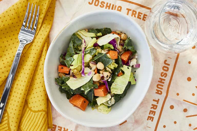 Fresh vegetable salad with kale, chickpeas, and roasted vegetables at Joshua Tree restaurant