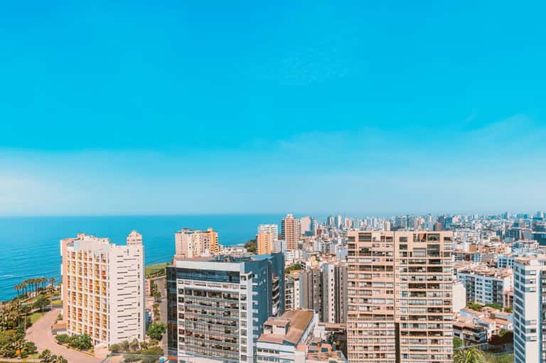 Coastal resort cityscape with Mediterranean beaches and modern residential towers