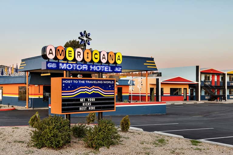 Vintage Americana Motor Hotel sign with colorful lettering and retro design