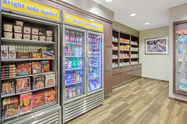 Convenience market with refrigerated beverage cases and packaged food products