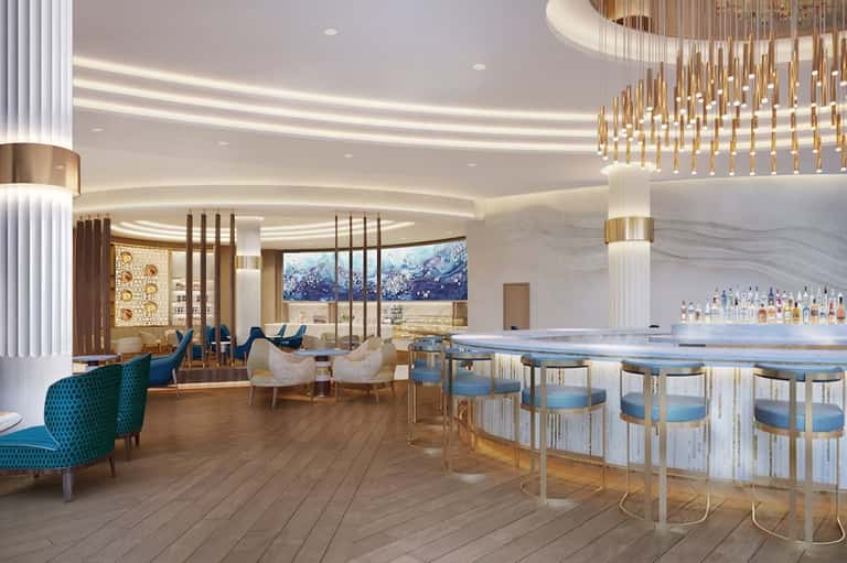Luxury lounge with elegant bar, gold pendant lights, modern furniture, and mountain landscape artwork