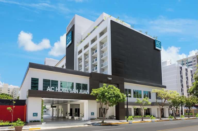 Modern AC Hotel San Juan exterior with contemporary architecture and street-level entrance