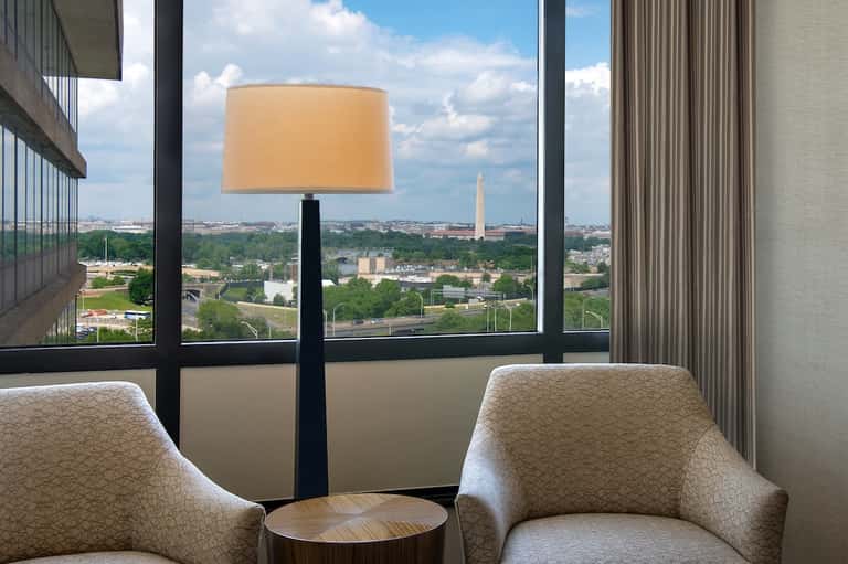 Hotel room seating area with view of Washington Monument and Capitol building