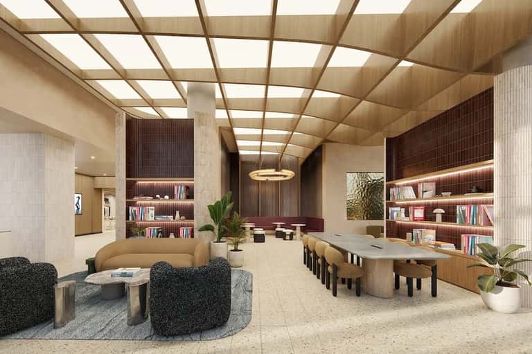 Contemporary lobby with curved seating, wooden ceiling, bookshelves, and modern furnishings