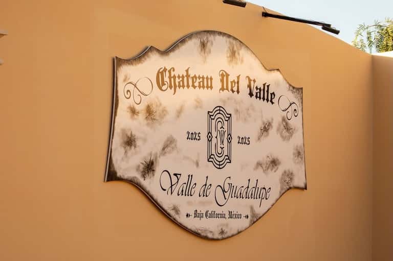 Chateau Del Valle estate plaque on terracotta wall in Valle de Guadalupe, Baja California, Mexico