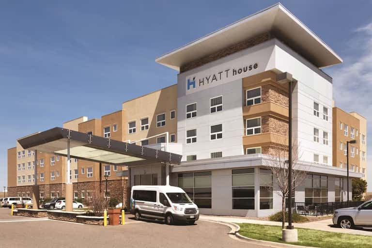Hyatt House exterior entrance with modern architecture and covered portico