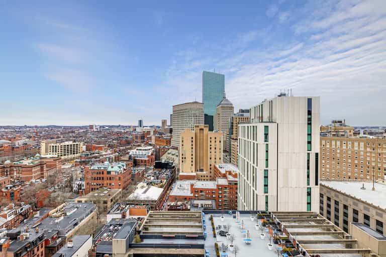 Aerial view of downtown cityscape with brick buildings and modern skyscrapers