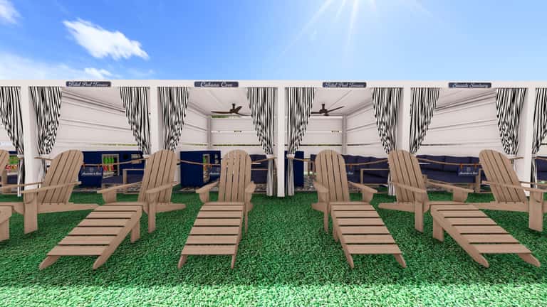 Multiple Adirondack chairs under white cabanas with striped curtains on artificial grass