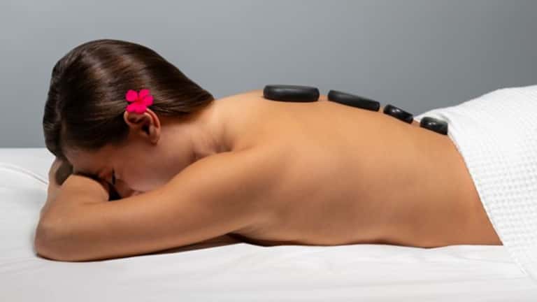 50-Minute Signature Massage + Day Pass