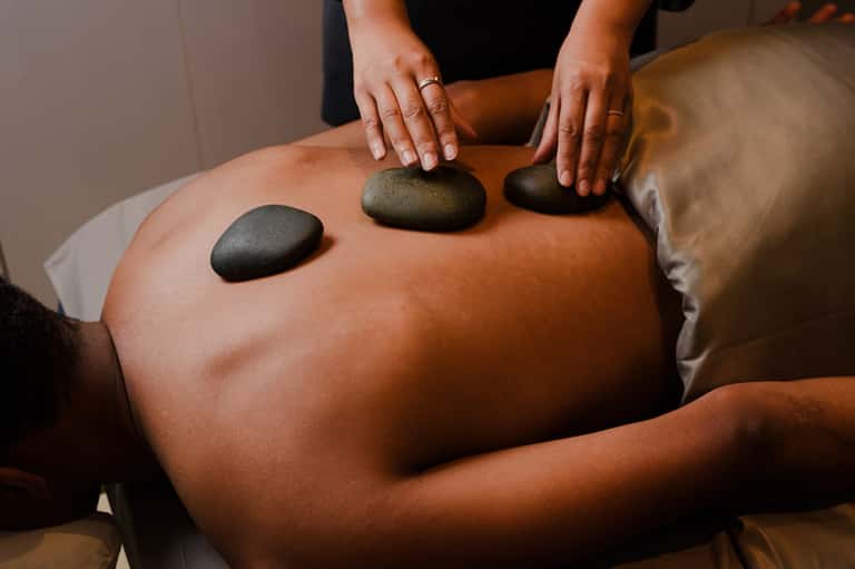 50-Minute Performance Massage + Day Pass