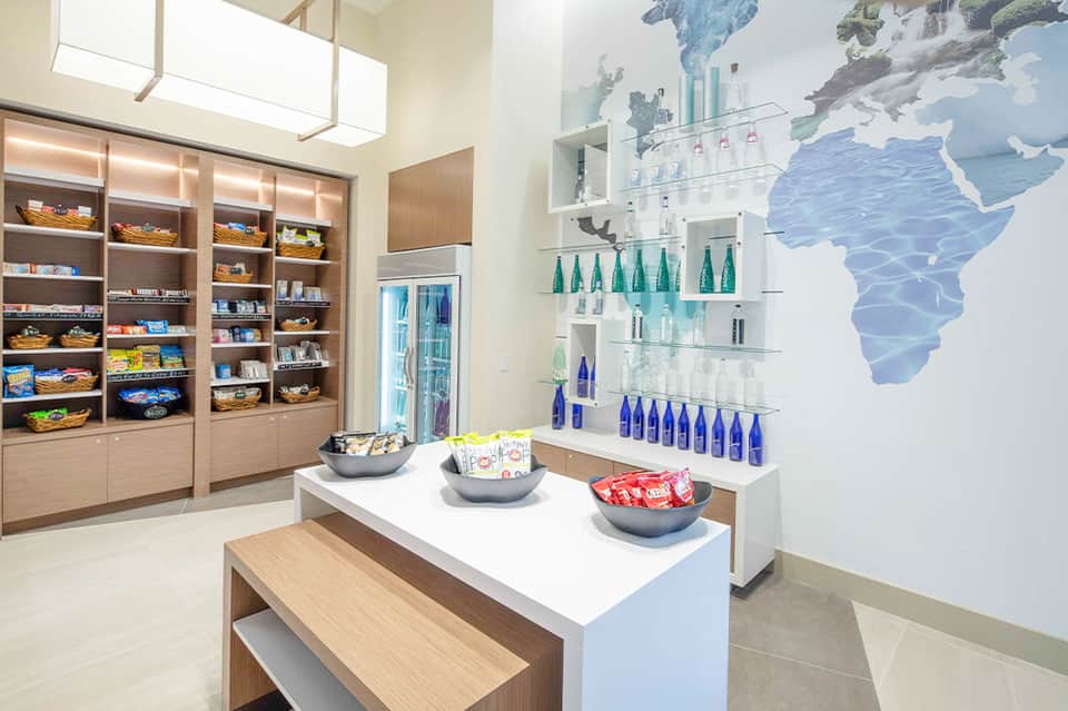 Contemporary retail space with wooden shelving, product displays, and world map wall decoration