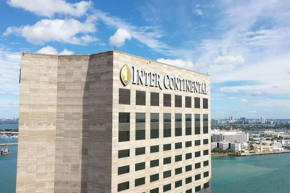 Inter Continental hotel building with ocean and turquoise water views in tropical coastal location