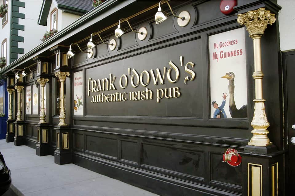 Frank O'Dowd's Authentic Irish Pub storefront with dark facade and brass details