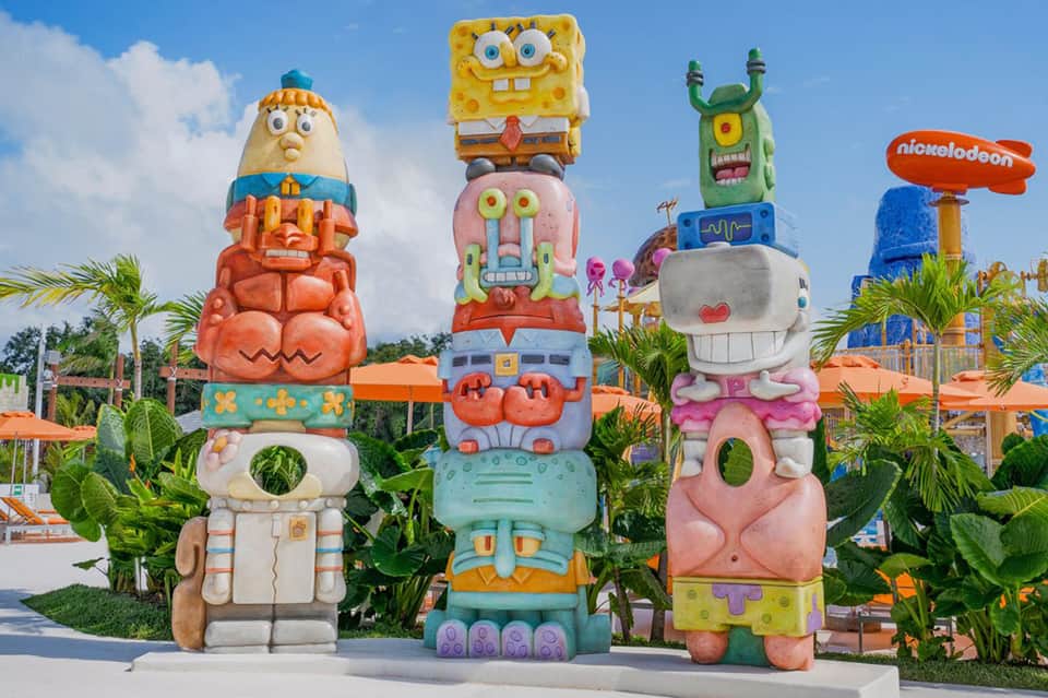 Colorful Nickelodeon character sculptures displayed at theme park entrance