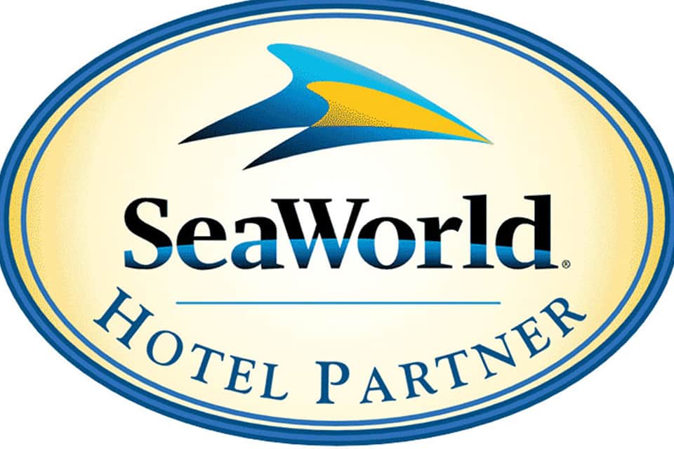 SeaWorld Hotel Partner logo in oval blue and yellow badge format
