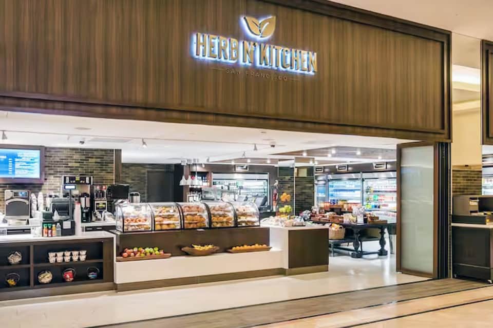 Modern Here's Kitchen restaurant counter with bakery and food displays