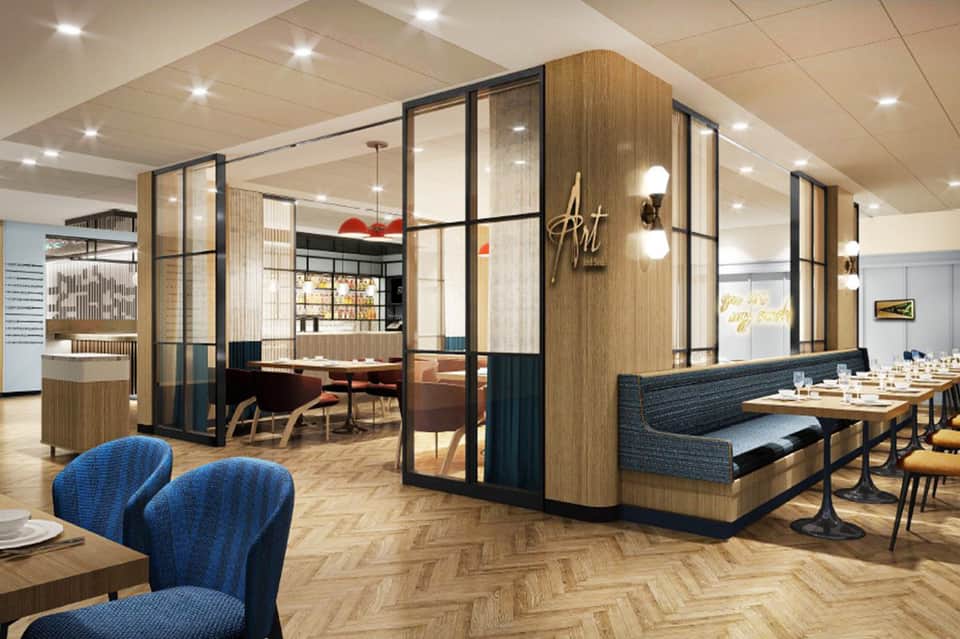 Contemporary restaurant interior with wood and glass partitions, blue chairs, and modern lighting