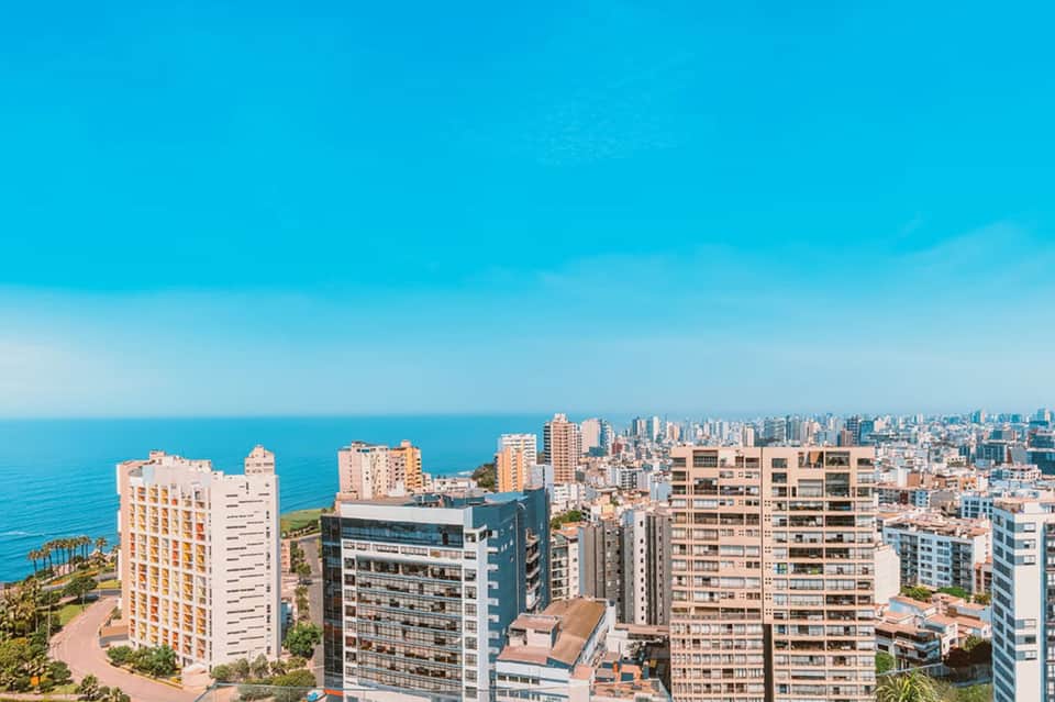 Coastal resort cityscape with Mediterranean beaches and modern residential towers