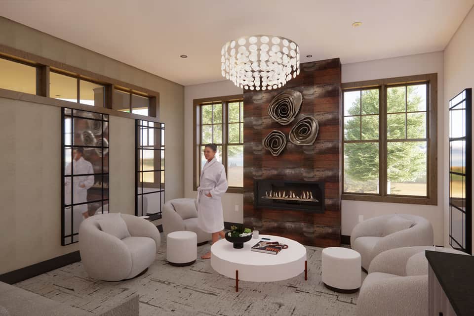 Modern spa lounge with curved cream seating, fireplace, crystal chandelier, and large windows