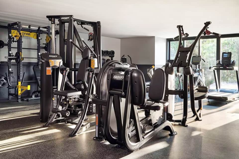 State-of-the-art fitness center with Hoist exercise equipment and cardio machines