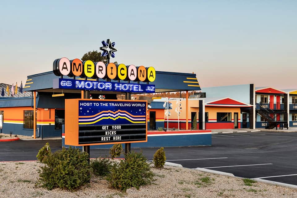 Vintage Americana Motor Hotel sign with colorful lettering and retro design
