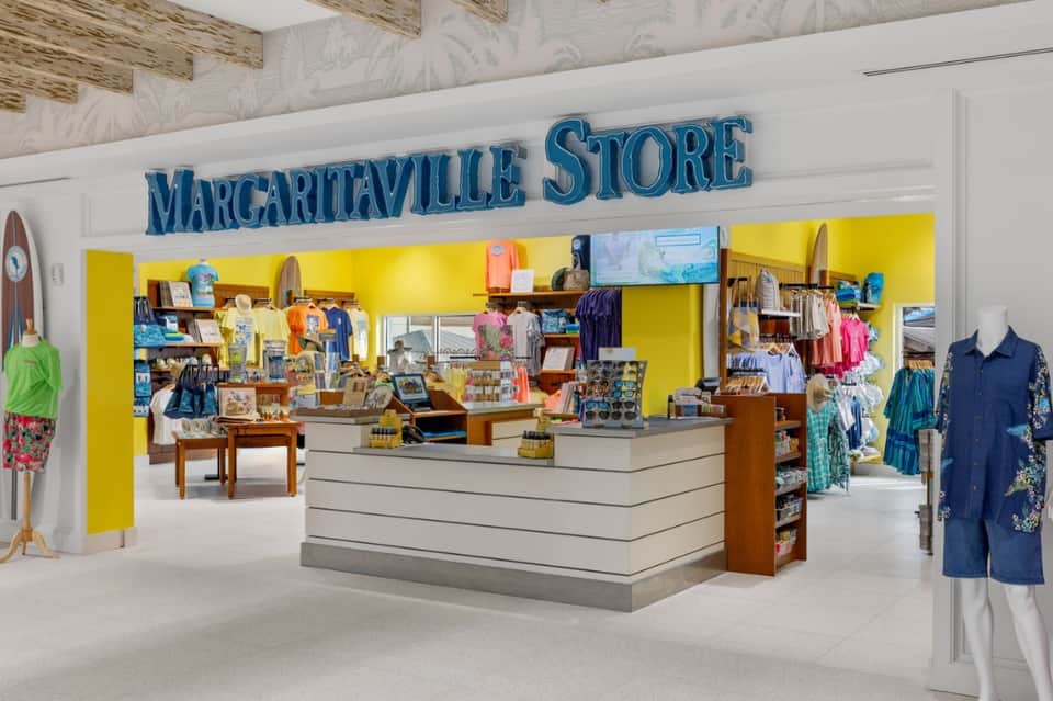 Margaritaville Store interior with bright yellow display walls and merchandise