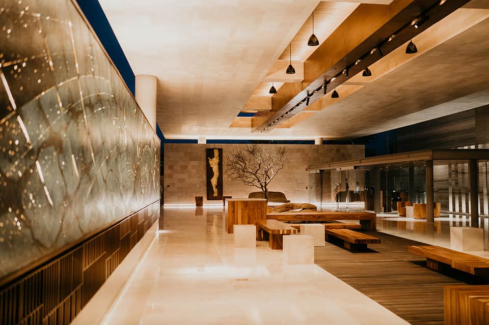 Modern spa or wellness center with wooden beams, natural materials, and minimalist interior design