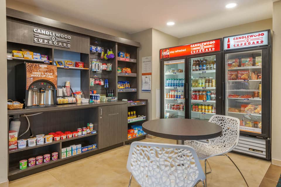 Candlewood Cupboard convenience store with refrigerated beverages and snacks