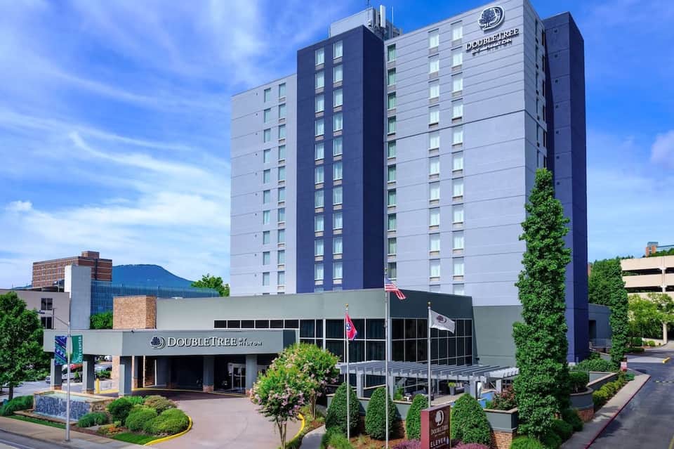 DoubleTree hotel exterior with multi-story tower and welcoming entrance