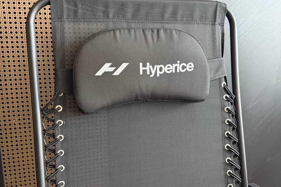 Hyperice branded gray fitness chair or recovery device with metal frame