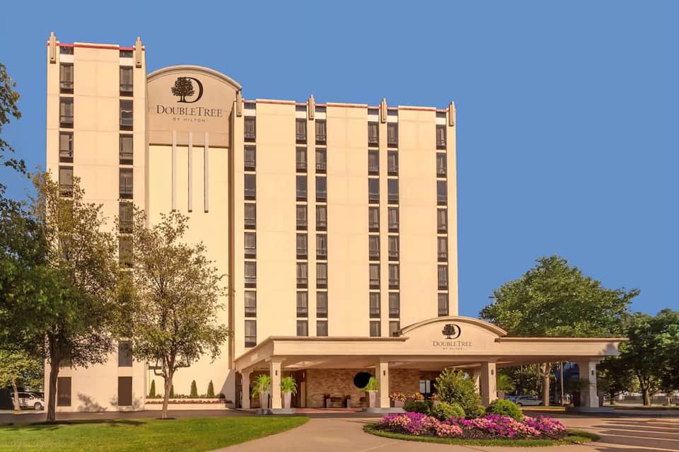 DoubleTree by Hilton hotel exterior with cream-colored facade and entrance canopy