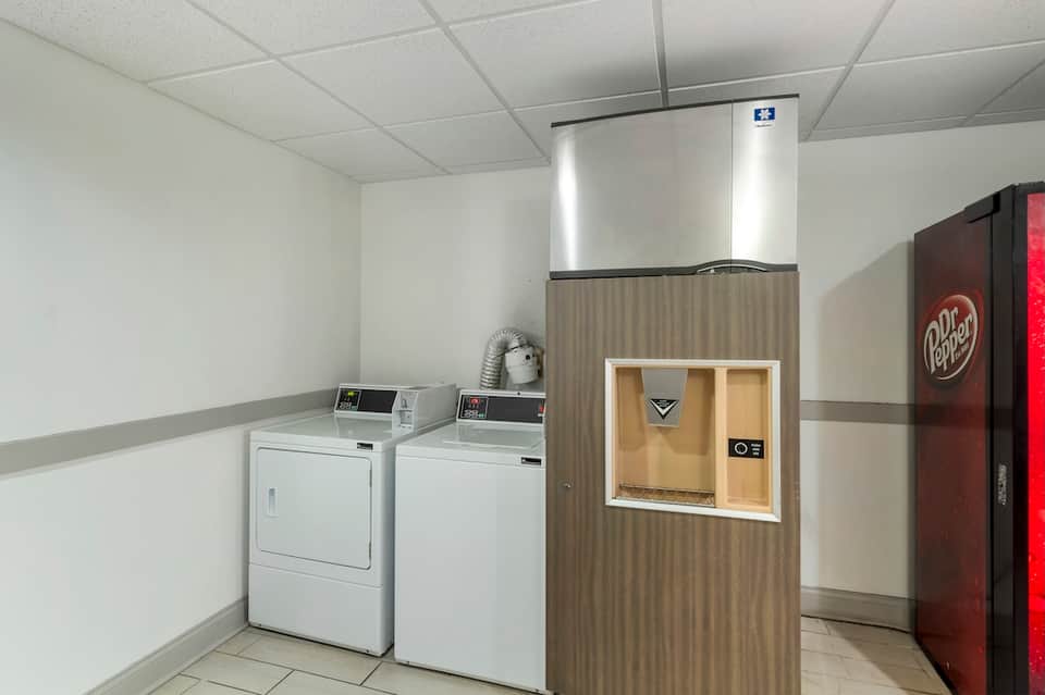 Hotel laundry facility with washers, dryers, ice machine, and vending machine