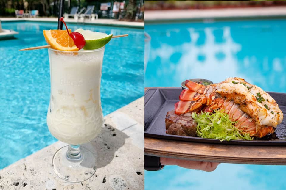 Tropical cocktail by poolside with grilled seafood platter garnished with lobster and fresh greens