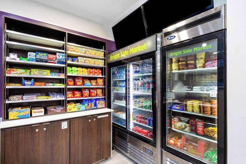 Bright Side Market convenience store with snack shelves and refrigerated beverage cases