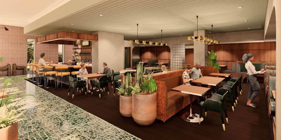 Modern hotel lobby and dining area with warm wood accents, bar seating, pendant lighting, and potted plants throughout the space