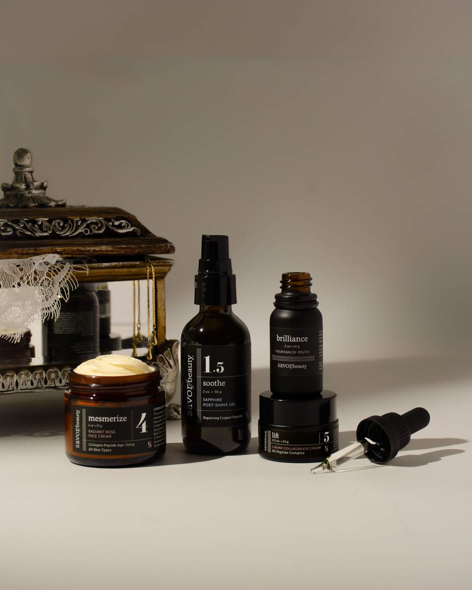 Selected Savor Beauty products including face cream, post-shave oil, and eye cream displayed